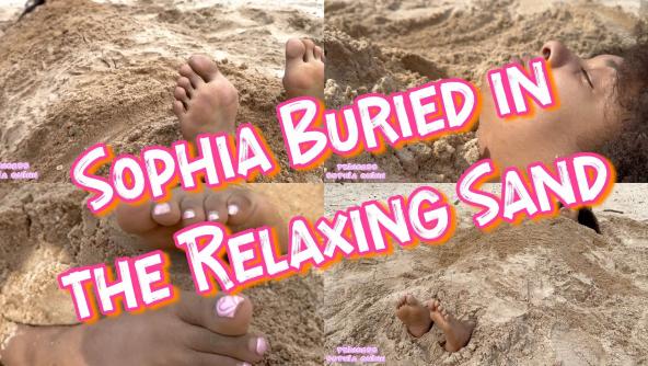 Sophia Buried in the Relaxing Sand w/ Her Feet Out ! 